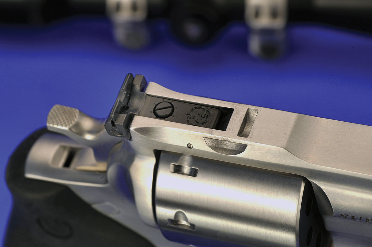 Closer in, you can see the detailing of the top strap, including the rear sights and notch for the Ruger rings. The hammer spur is checkered for a non-slip surface.